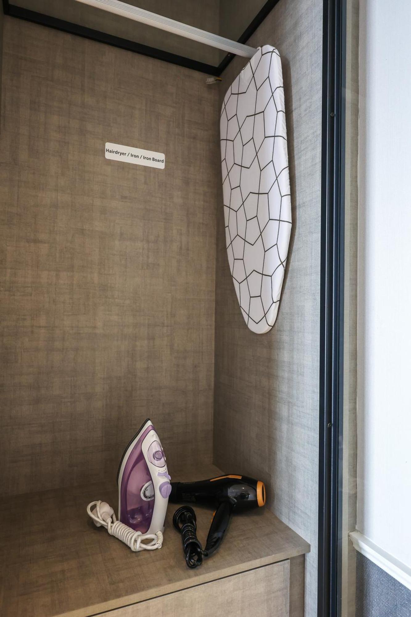 Ferienwohnung Millerz Square By Mykey Kuala Lumpur Exterior foto A refrigerator with a built-in ironing board